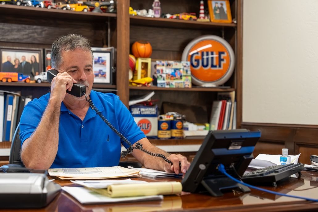 employee on phone at desk