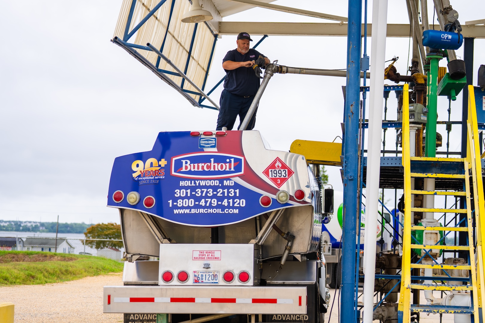 Burch employee refueling heating oil truck