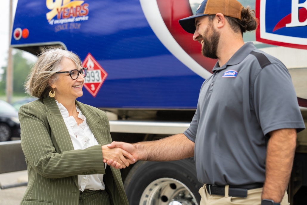 Burch_CustomerInteraction-14 Burch technician shaking hands with a customer