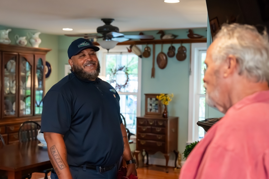 Burch_CustomerInteraction-6 Burch technician speaking to customer.