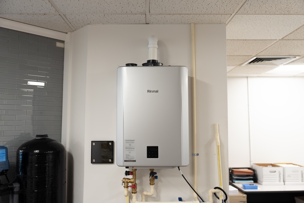 Burch_OfficeShowroomProducts-47 Rinnai tankless water heater on wall