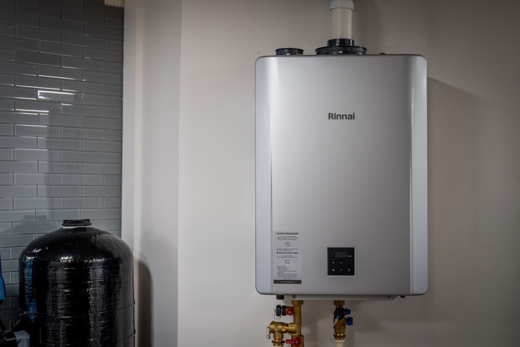 Burch_OfficeShowroomProducts-11 Rinnai tankless water heater on wall
