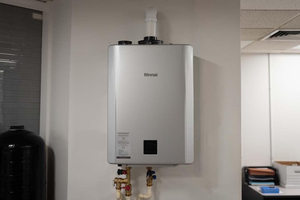 Burch_OfficeShowroomProducts-12 Rinnai tankless water heater on wall