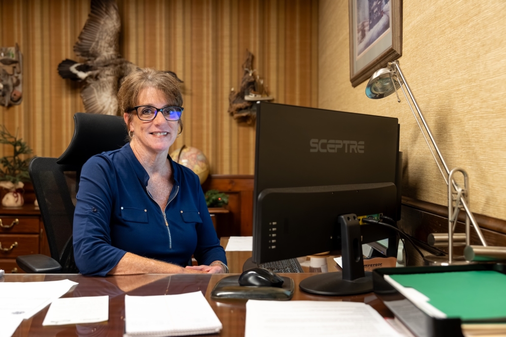 Burch Oil & Propane employee smiling at a desk