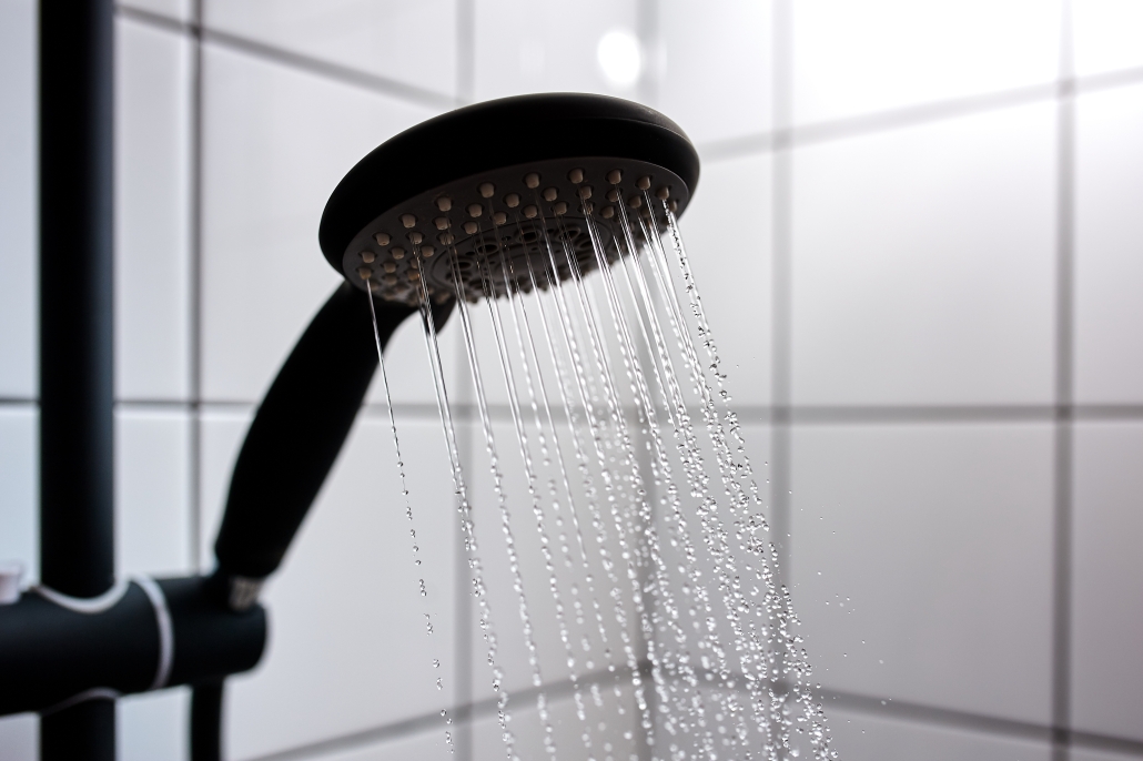 shower head with water heated by propane tankless water heater